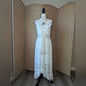 White high low dress with tassels